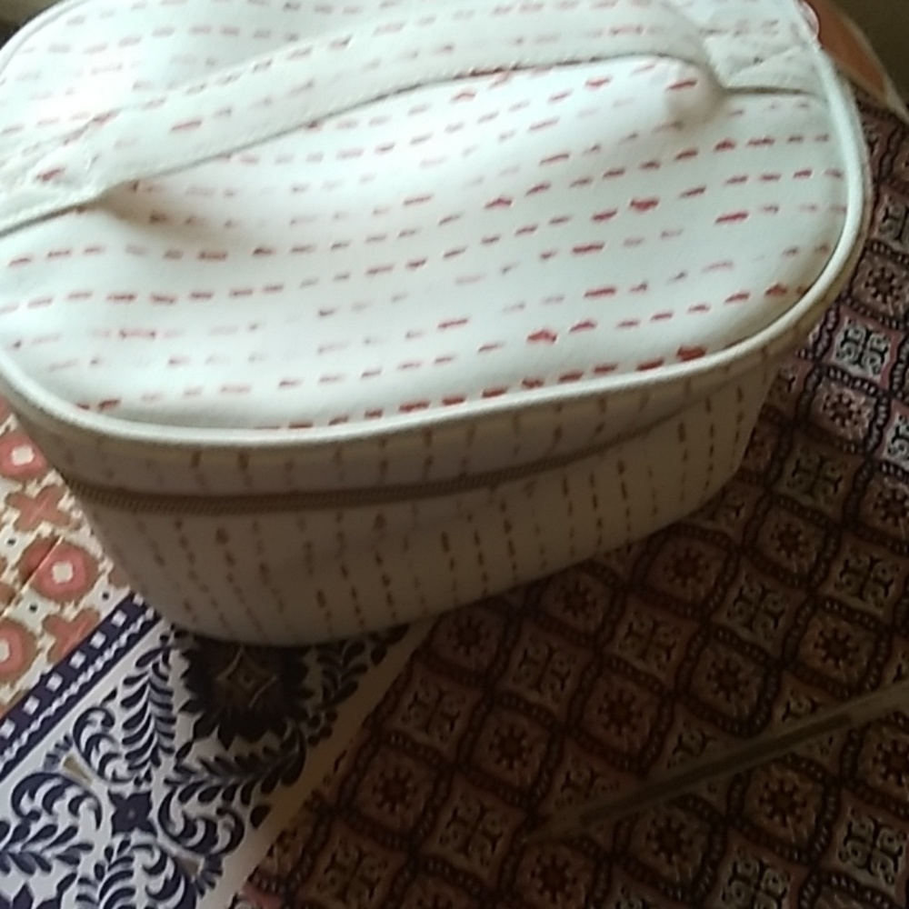 Orange and white makeup bag